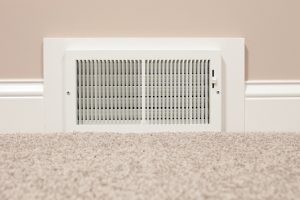vent near carpeted floor inside home